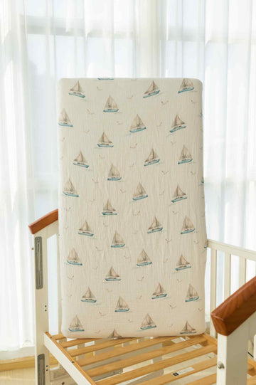 Sailboat muslin crib sheet by Flowing Creations